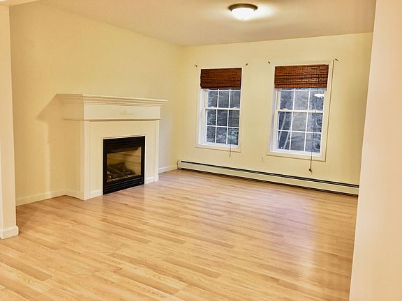 Living room and fireplace view 
from kitchen