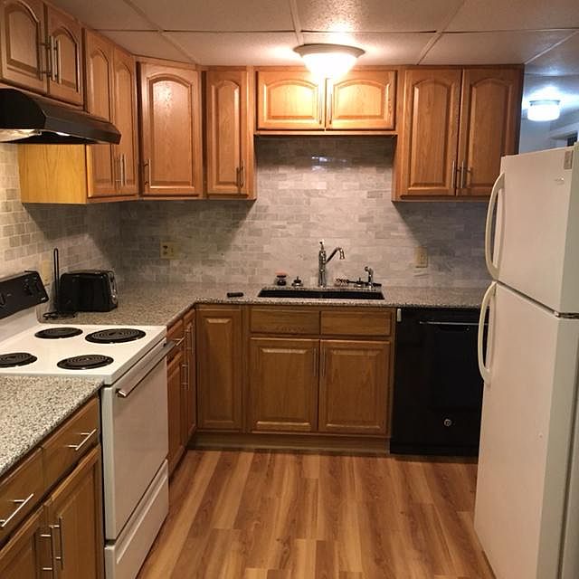 Granite counters, marble back splash, dishwasher