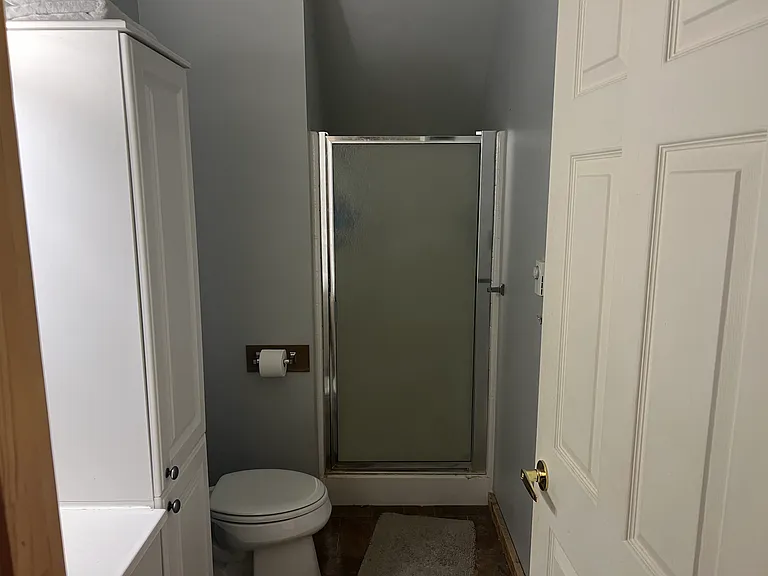 bathroom with shower stall