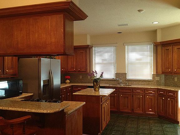 NEWLY REPLACED GRANITE COUNTERTOP, SINK & FAUCET.