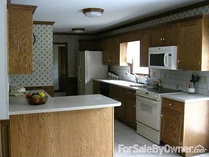 kitchen
						:
						ceramic tile , solid surface countertops, custom cabinets