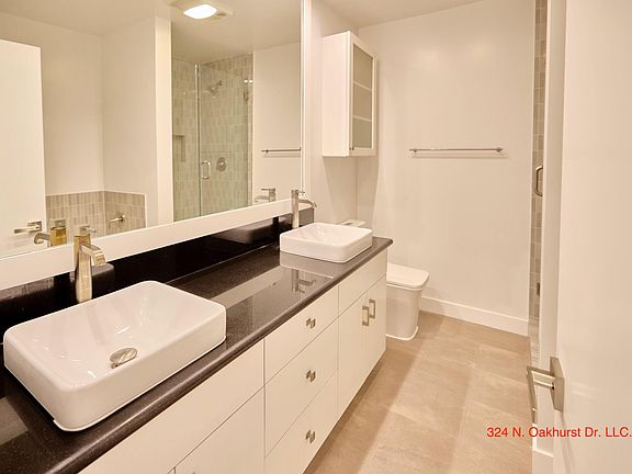 Master Bathroom has a Duel Sink Vanity with Lots of Storage