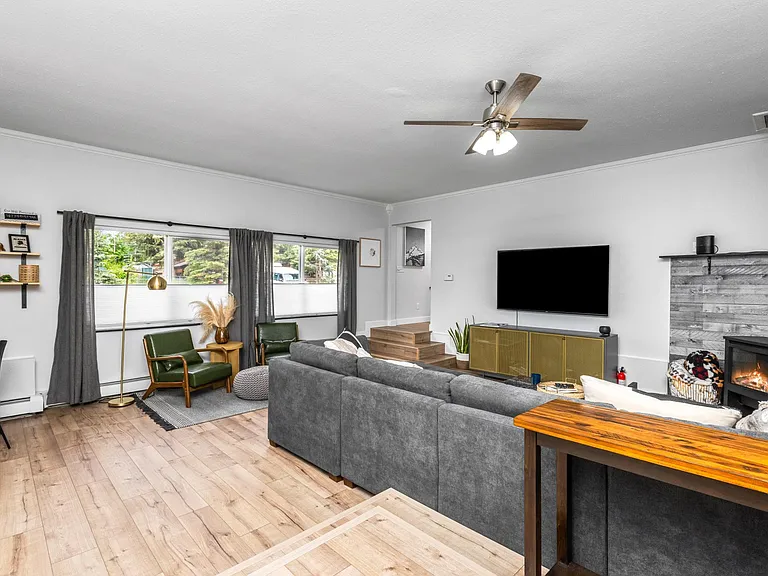 main area, fireplace and tv