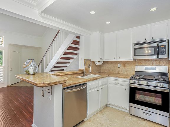 Kitchen opens to the living space and has brand new appliances
