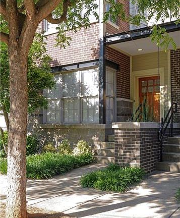 Landscaped sidewalk entrance on 9th Avenue with ample parking for guests and easy delivery. Private, gated parking for 2 residents is provided at back entrance to the home.