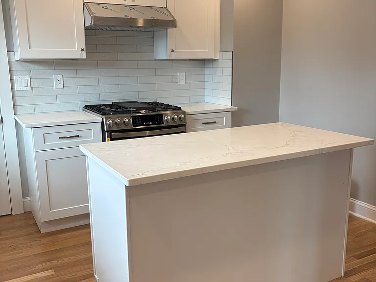 Kitchen - New hardwood floors, new cabinets, new countertops, new appliances, new windows, new doors, new insulation, new sheetrock, new electrical and Plumbing.