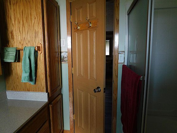 Linen cupboard in bathroom