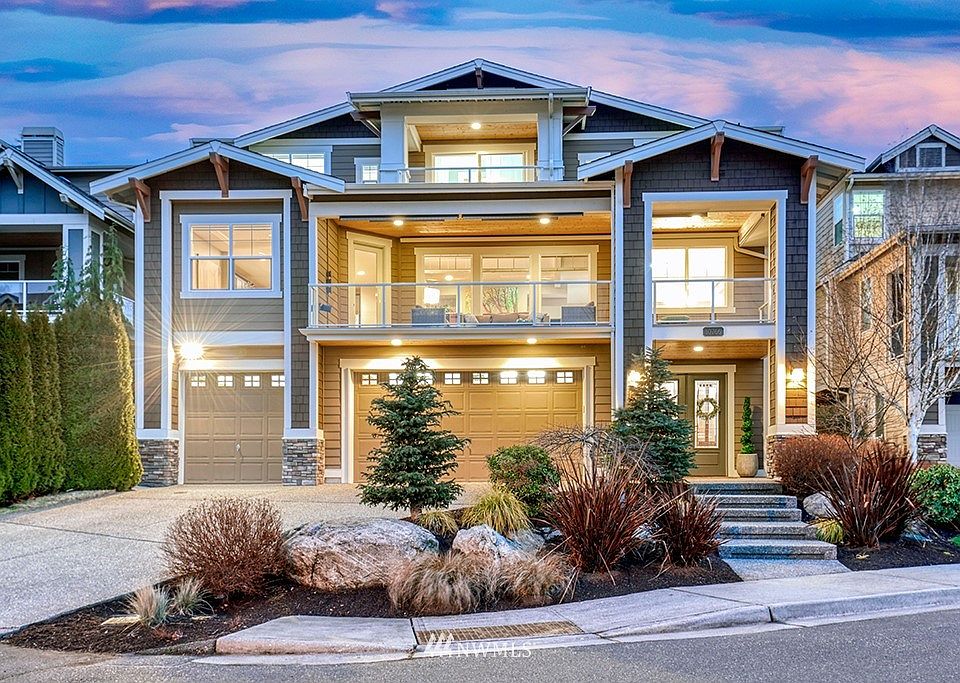 Beautiful front evening shot. Western valley views from each of the rooms. Professionally landscaped. The mid deck is set up with overhead heaters, Sono speakers, and sunshades...All-year enjoyment. The upper personal deck is for the Primary Suite.