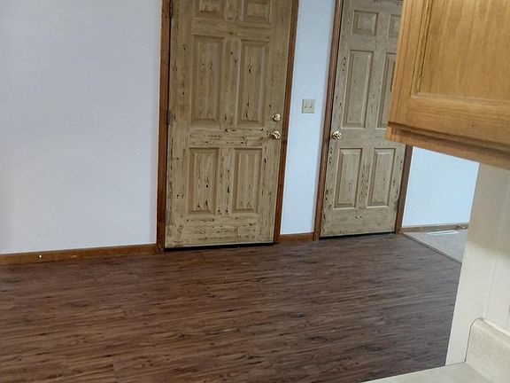 Entry door on the left- garage door on the right