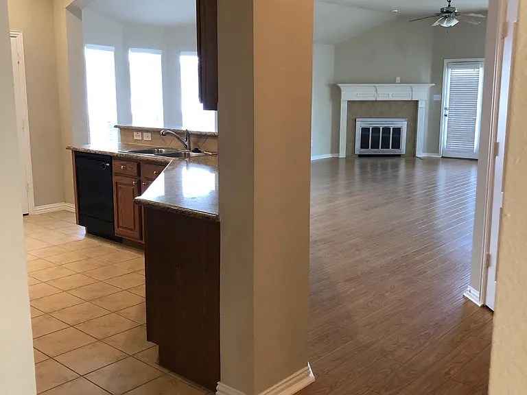 front door hall way to family room, kitchen to the left