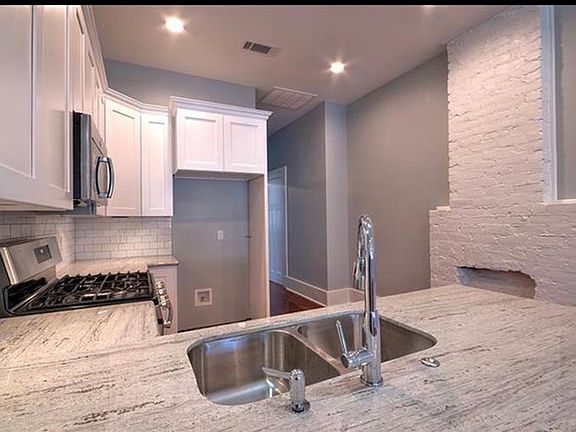 Refrigerator has been installed since photo!