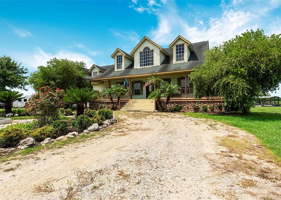 Beautiful and rare 3 bedroom 2.5 bath country home with 5.7 acres of waterfront near Galveston's West Bay. Bring your boat as we
