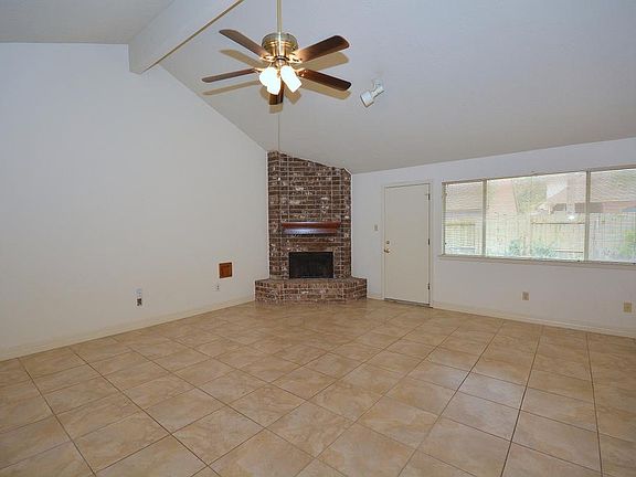 Woodburning fireplace in the den!