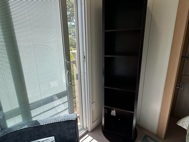 Bedroom #2 - full-length mirror swivels to have storage on the other side