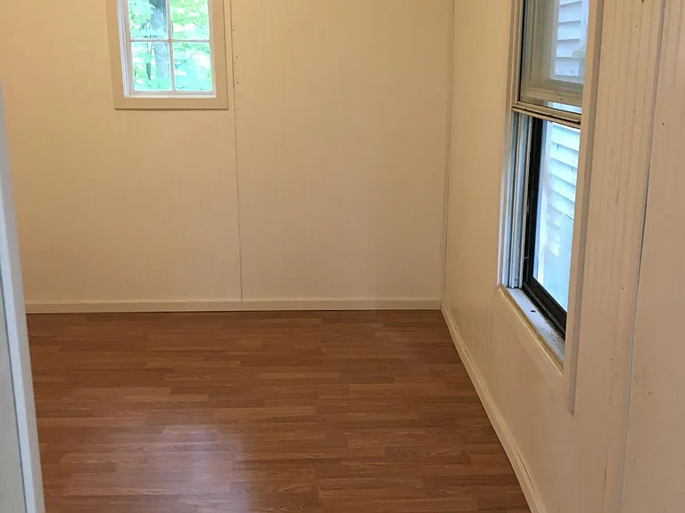 Unheated Storage room with dryer hook up.