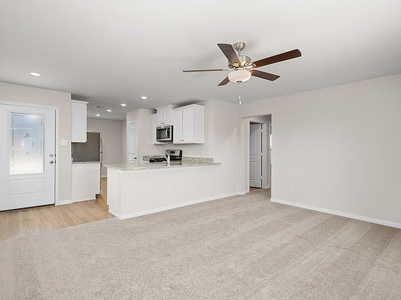 The open concept plan is perfect for hosting.