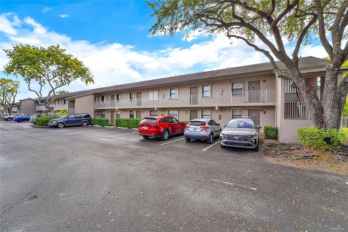 Building Photo - 7668 SW 152nd Ave #2-211