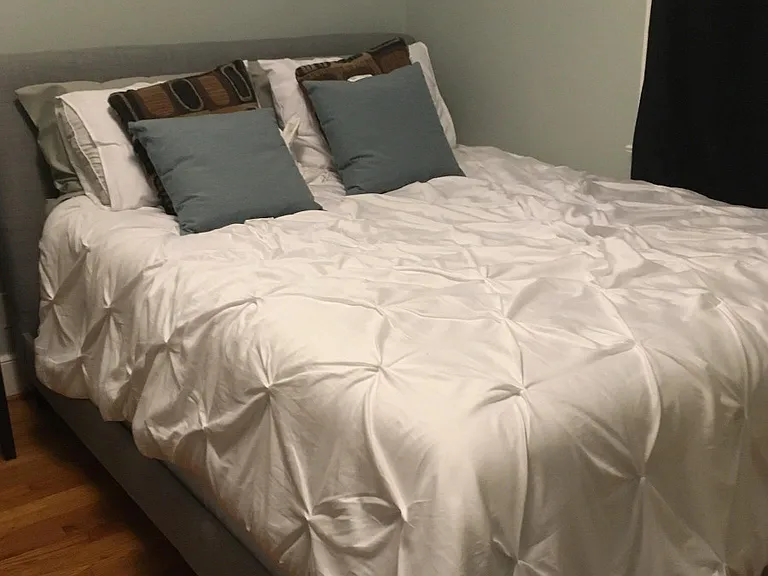 west room again (available). full size closet. two modern, updated windows. furnished with bed, desk, chest of drawers, shelving.