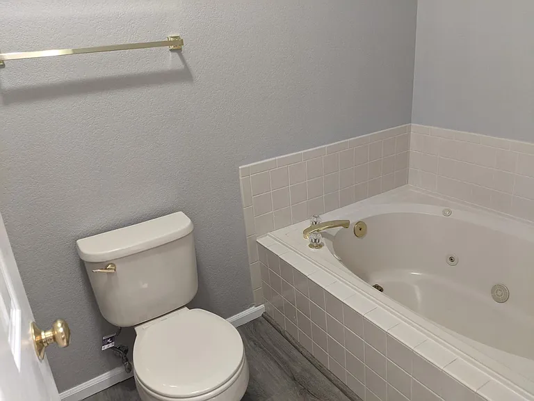 Private Bathroom, soaking tub and toilet