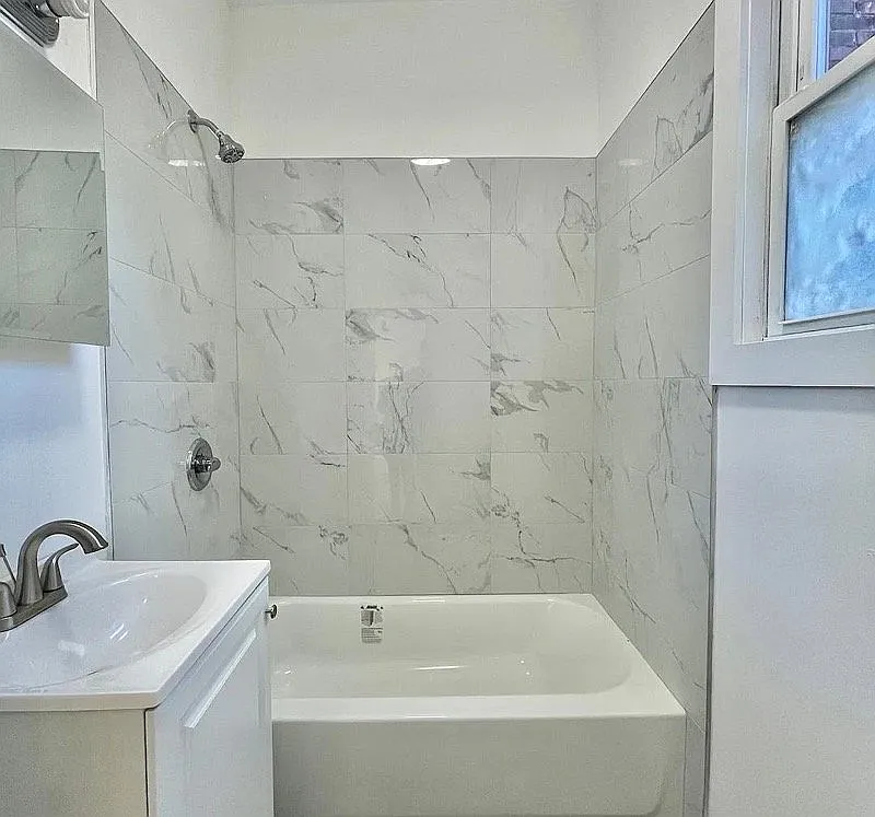 This newly renovated 3-bedroom, 1-bathroom apartment offers 800 square feet of comfortable living sp — Photo 3