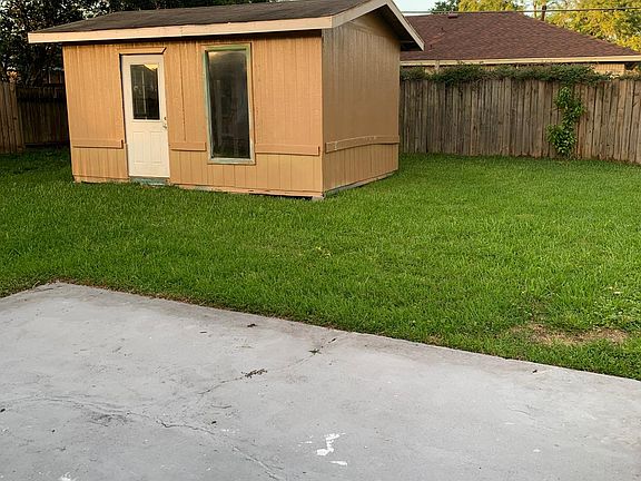 Large backyard shed for extra storage.