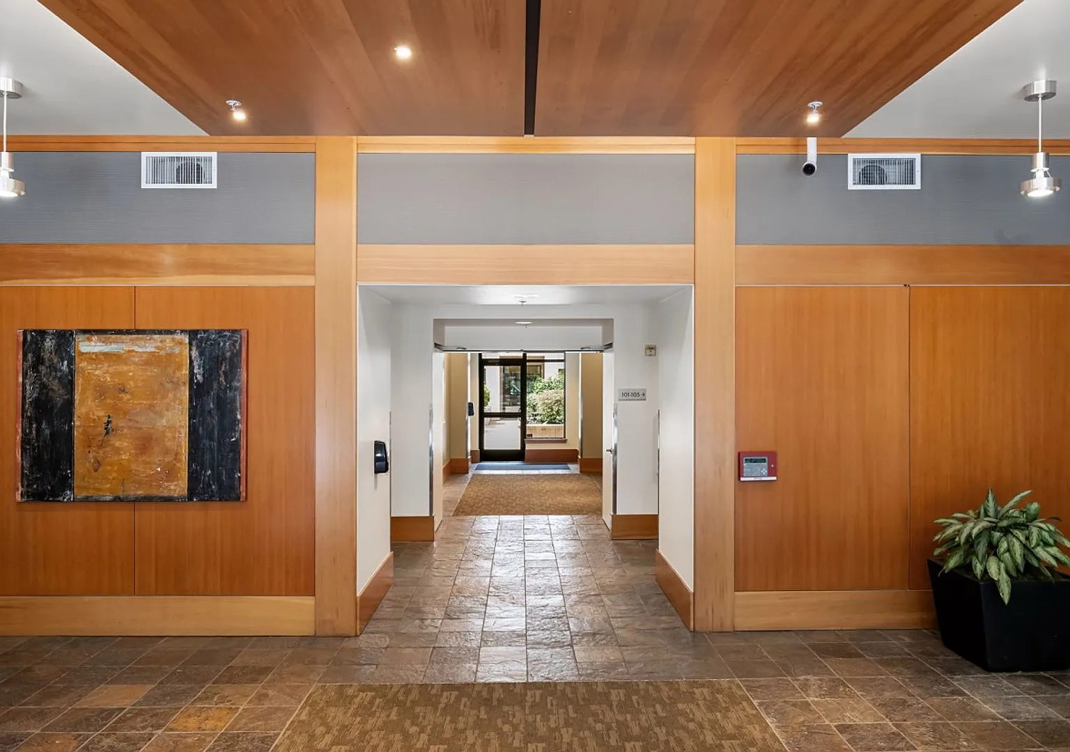 Ground-Floor Corner 2BR + Den at Riverstone Private Courtyard Entrance & Terrace (Pearl District) — Photo 3