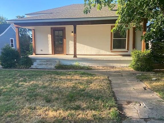 Front sidewalk leading to door