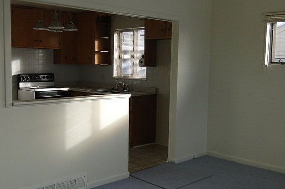 Upstairs Livingroom Looking Into Kitchen