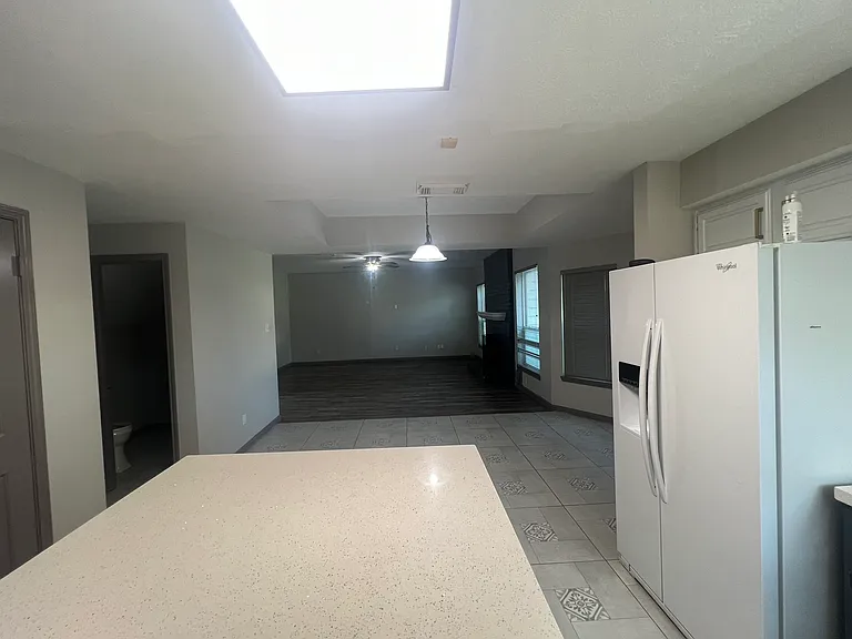 Kitchen looking out toward living room