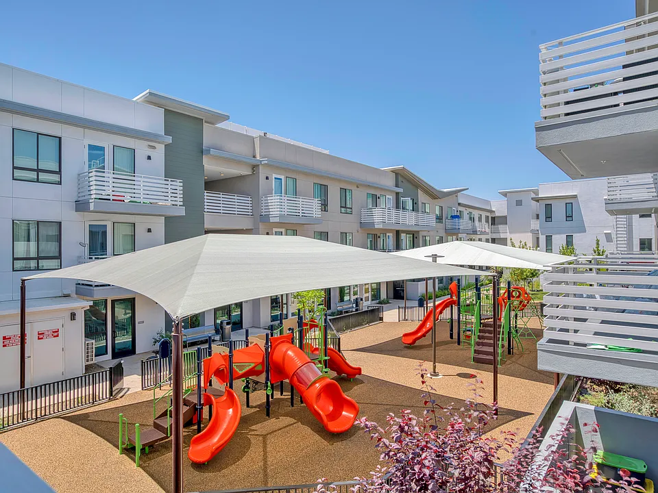 Welcoming play space designed with families in mind, featuring kid-friendly equipment.