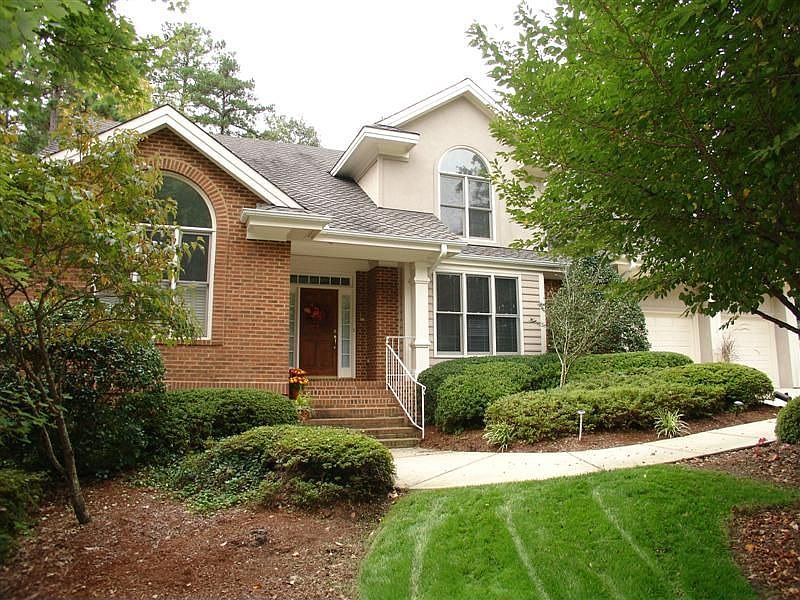 Fabulous executive home conveniently located by Swim & Tennis in GC community.