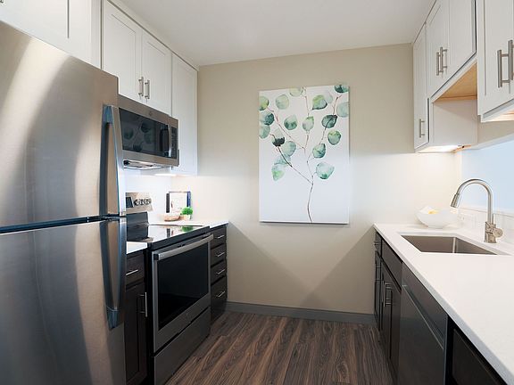 Two Tone Kitchen Cabinets and Stainless Appliances