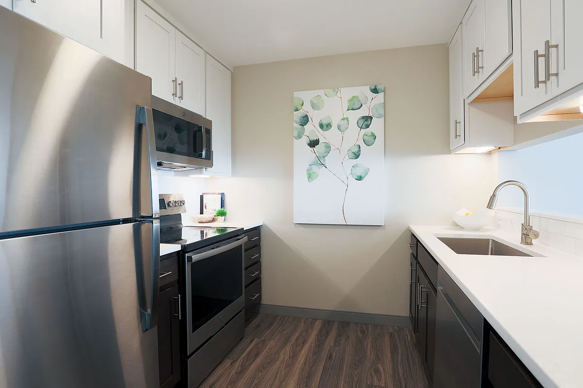 Two Tone Kitchen Cabinets and Stainless Appliances - Soundview Landing