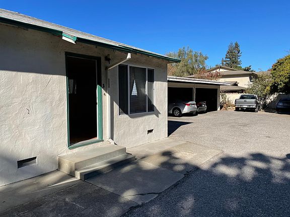 Front of unit. Carport in back. Includes one space