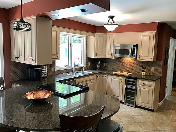 Kitchen, family room behind