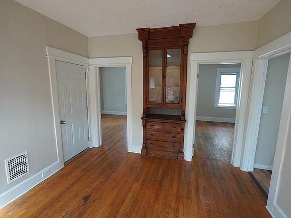 Living room with original 1925 built-in display cabinet