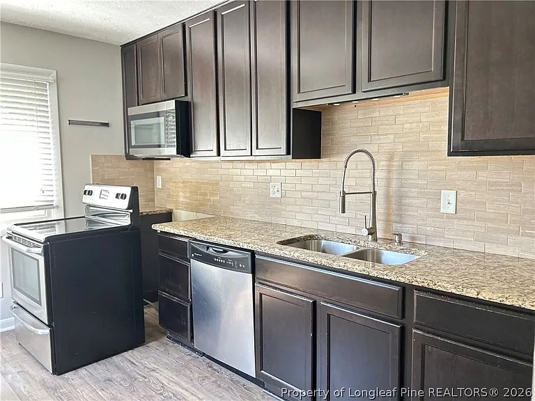 5914 Rustlewood Dr — Photo 6
