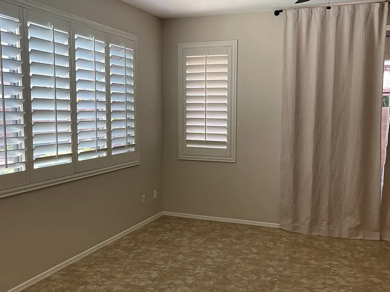Family room with sliding door to backyard covered patio.
