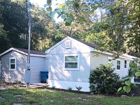 Side View of House Showing Addition (4th Master Bedroom) and Shed