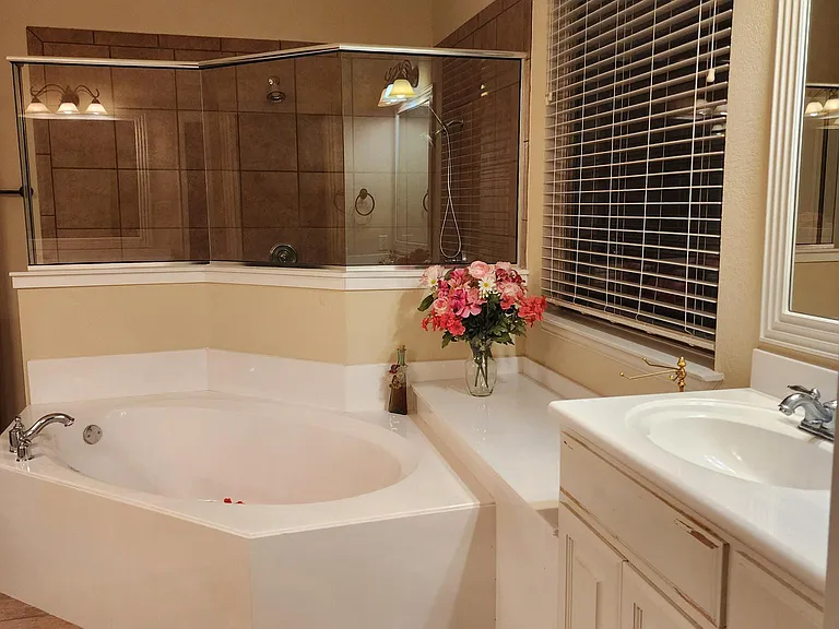 Master bath "his vanity" and tub