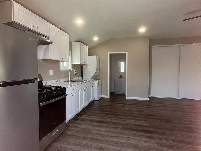 When you enter your new Unit washer and dryer are provided stove refrigerator straight ahead would be your bathroom