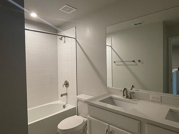 Upstairs bathroom located between the two secondary bathrooms. 2 of 3 bathrooms