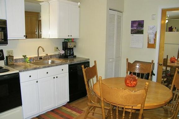 NEWER FURNACE IS BEHIND DOORS