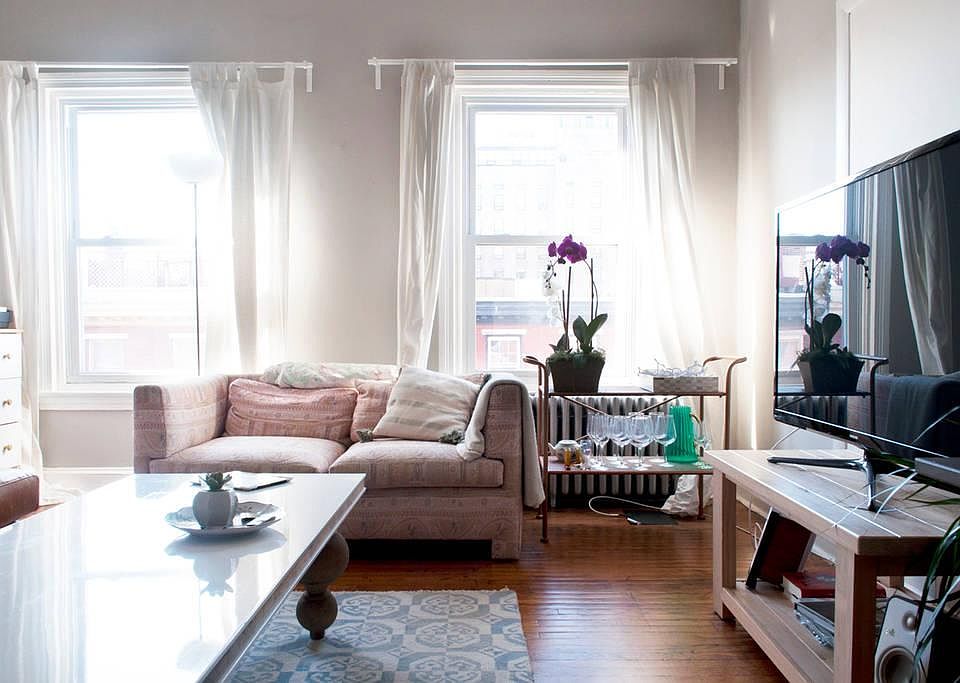 FRONT ROOM living room. Previousmphoto showed it empty. Sun all day as faces south.