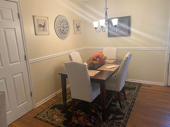dining room located beside the kitchen and living room