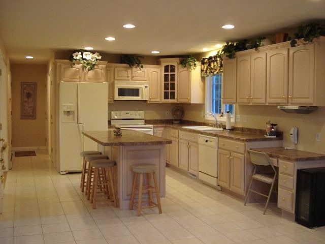 Center Island Kitchen with plenty of Custom Cabnietry