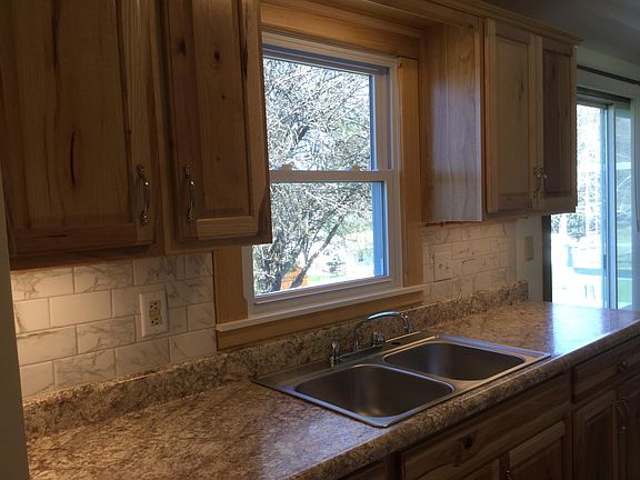 Kitchen sink; laminate countertops; under cabinet lighting
