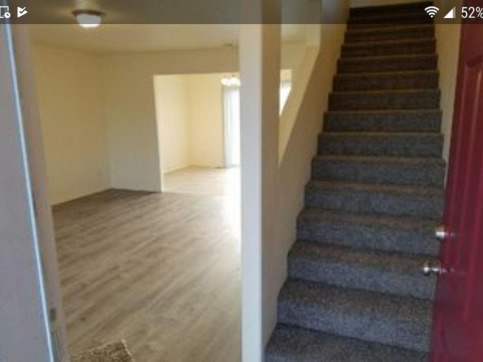 Modern design staircase with opening to living room