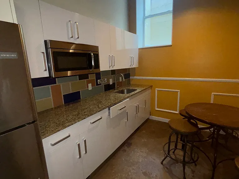 Kitchen In Lounge Area