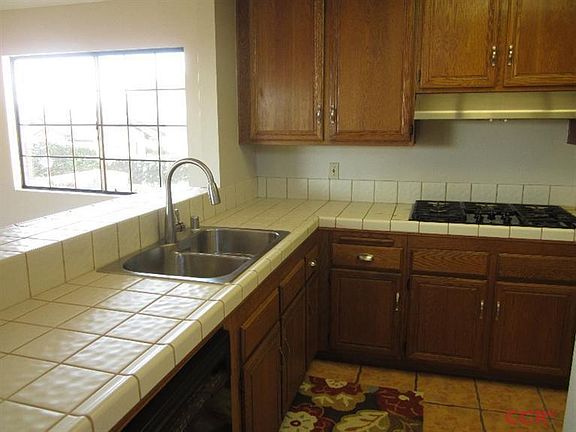 Kitchen with slight view of the ocean